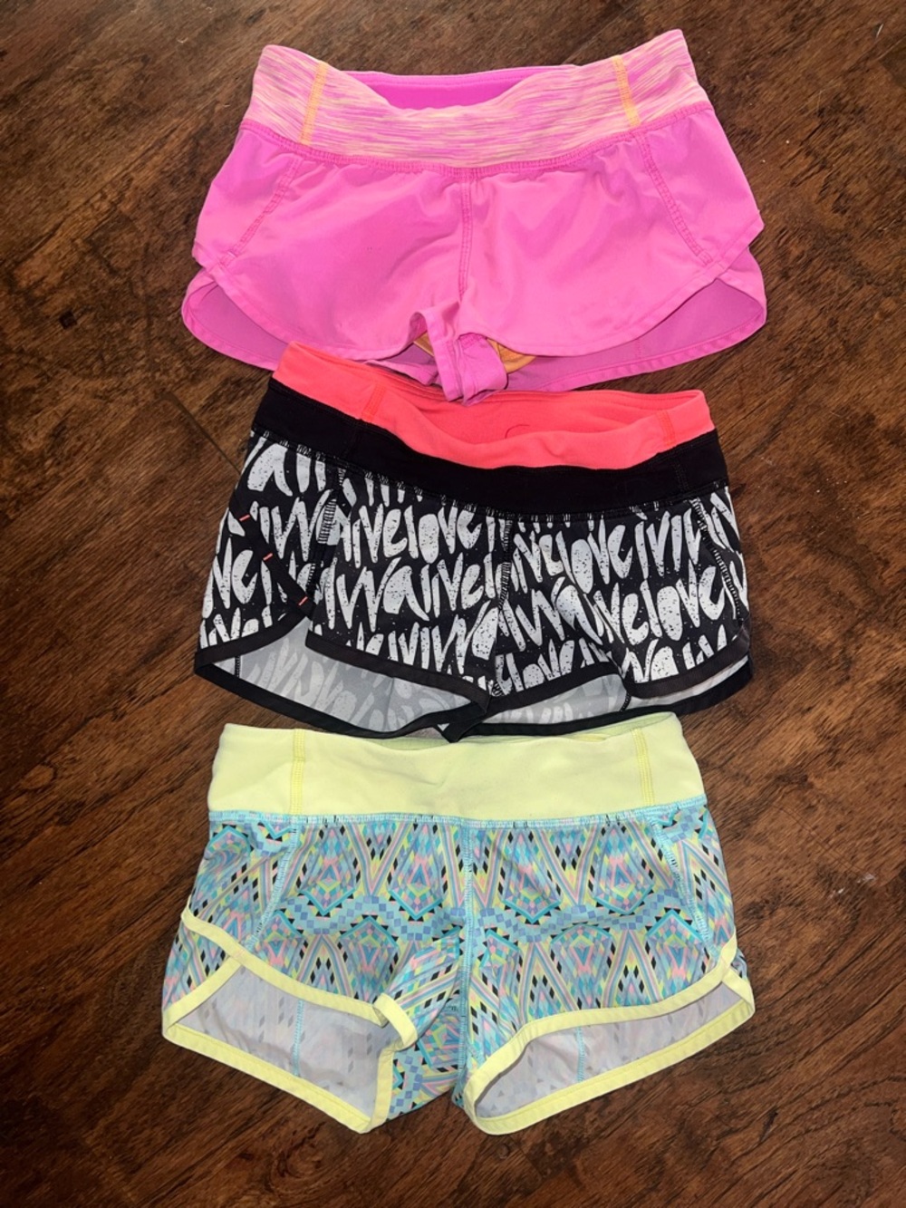 Ivivva Girls' Shorts - Coral Pink & Black/White & yellow abstract - size 6